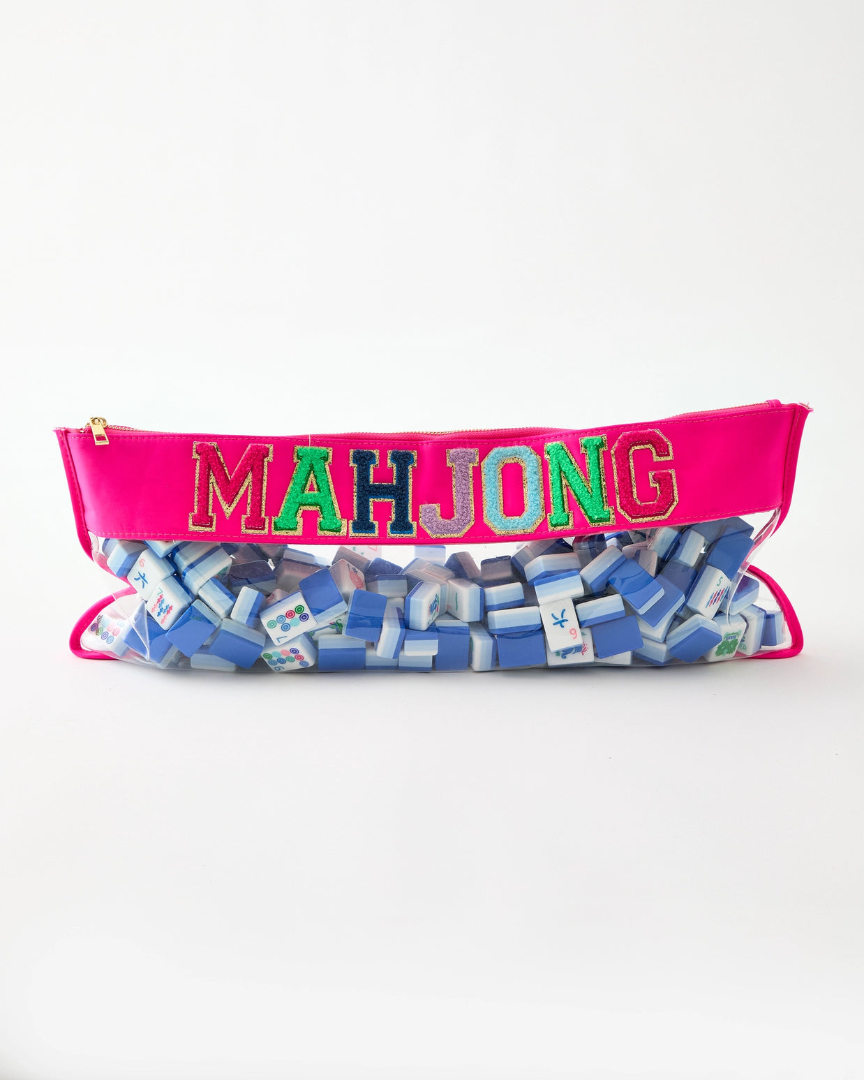Clear vinyl zippered pouch with hot pink trim displaying Mahjong text and filled with blue and white game tiles