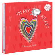 Red hardcover book with colorful rainbow nested hearts and illustrated character, titled 
