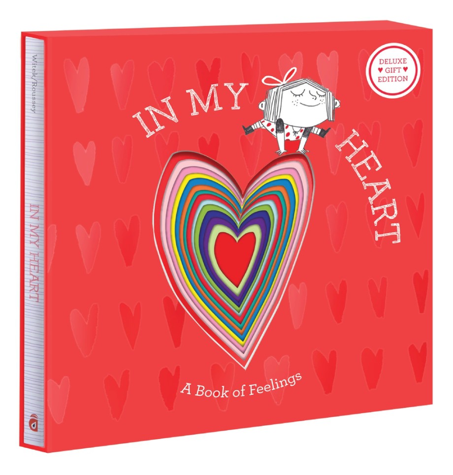 Red hardcover book with colorful rainbow nested hearts and illustrated character, titled 