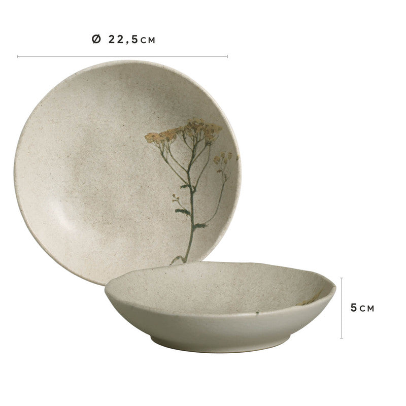 Speckled cream stoneware shallow bowl with pressed dried botanical stem creating delicate branch imprint in glaze