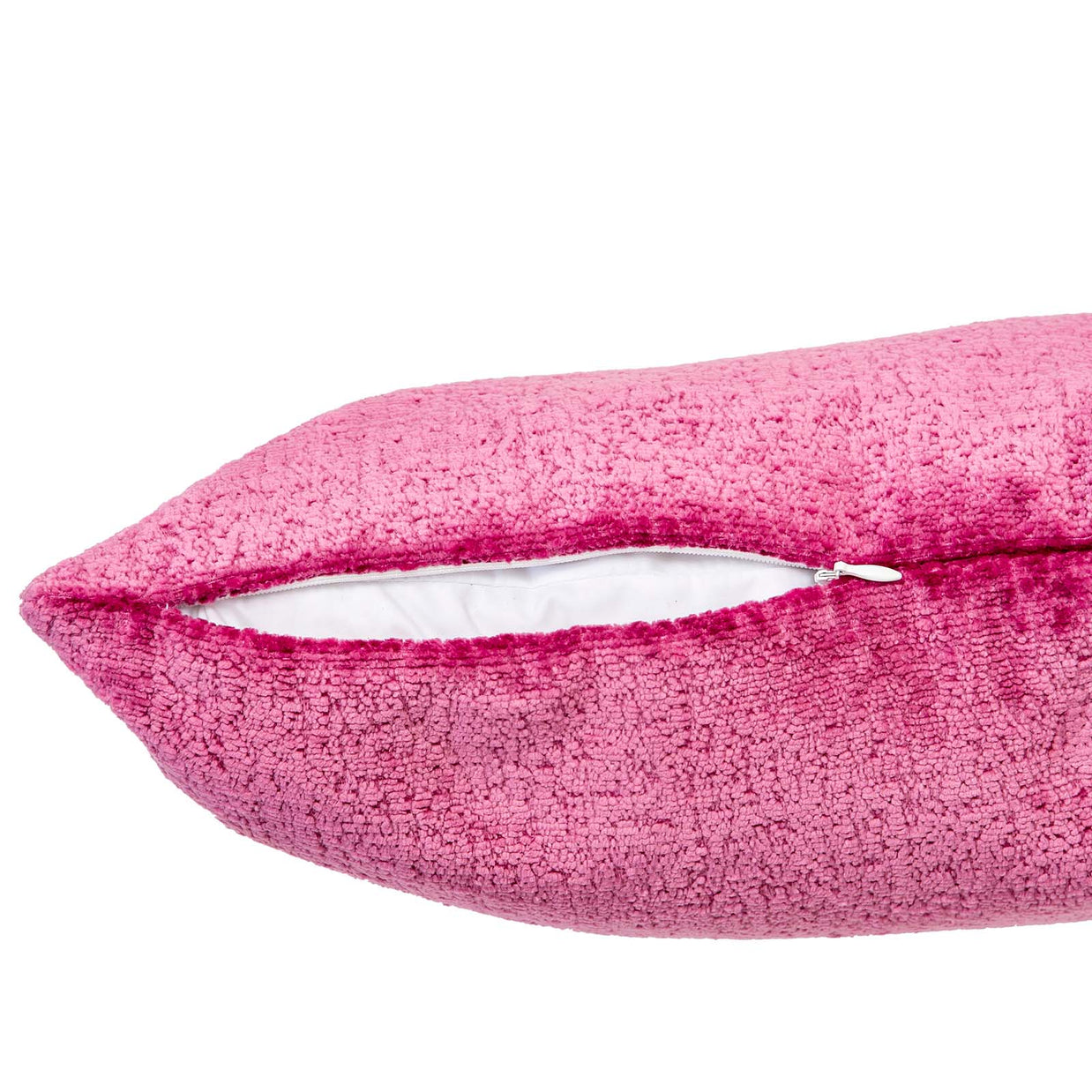 Pink boucle textured throw pillow with hidden zipper closure showing white interior lining on white background