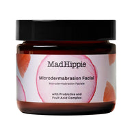 Dark amber glass jar with black lid, MadHippie microdermabrasion facial scrub with pink and orange watercolor label design
