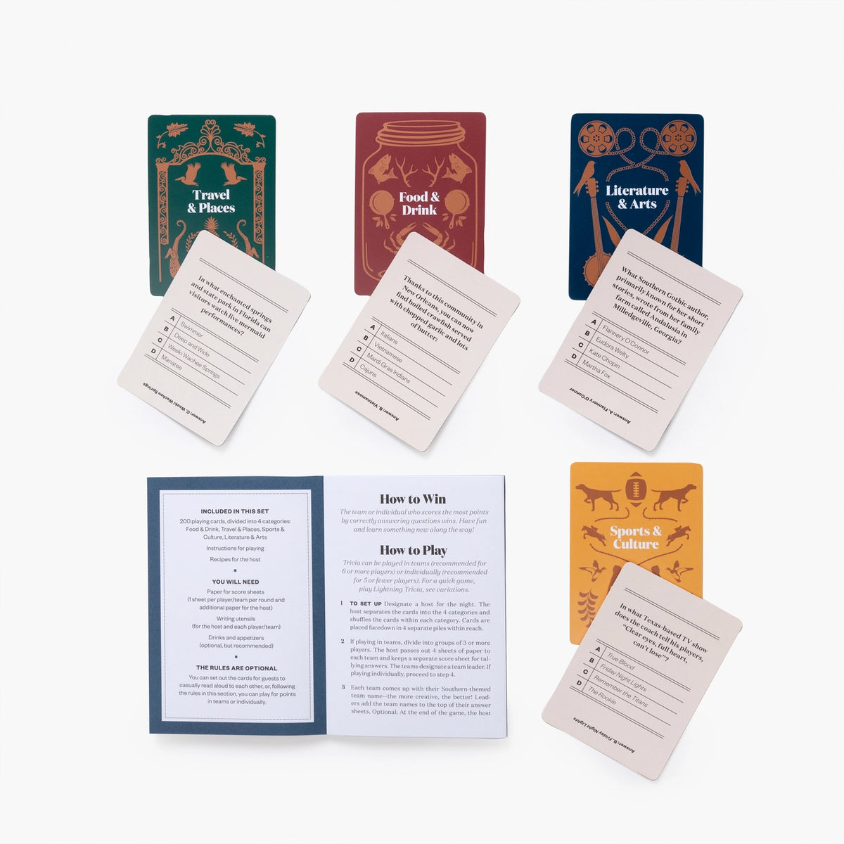 Trivia card game set with four decorative category cards in teal, burgundy, navy, and gold with ornate vintage patterns