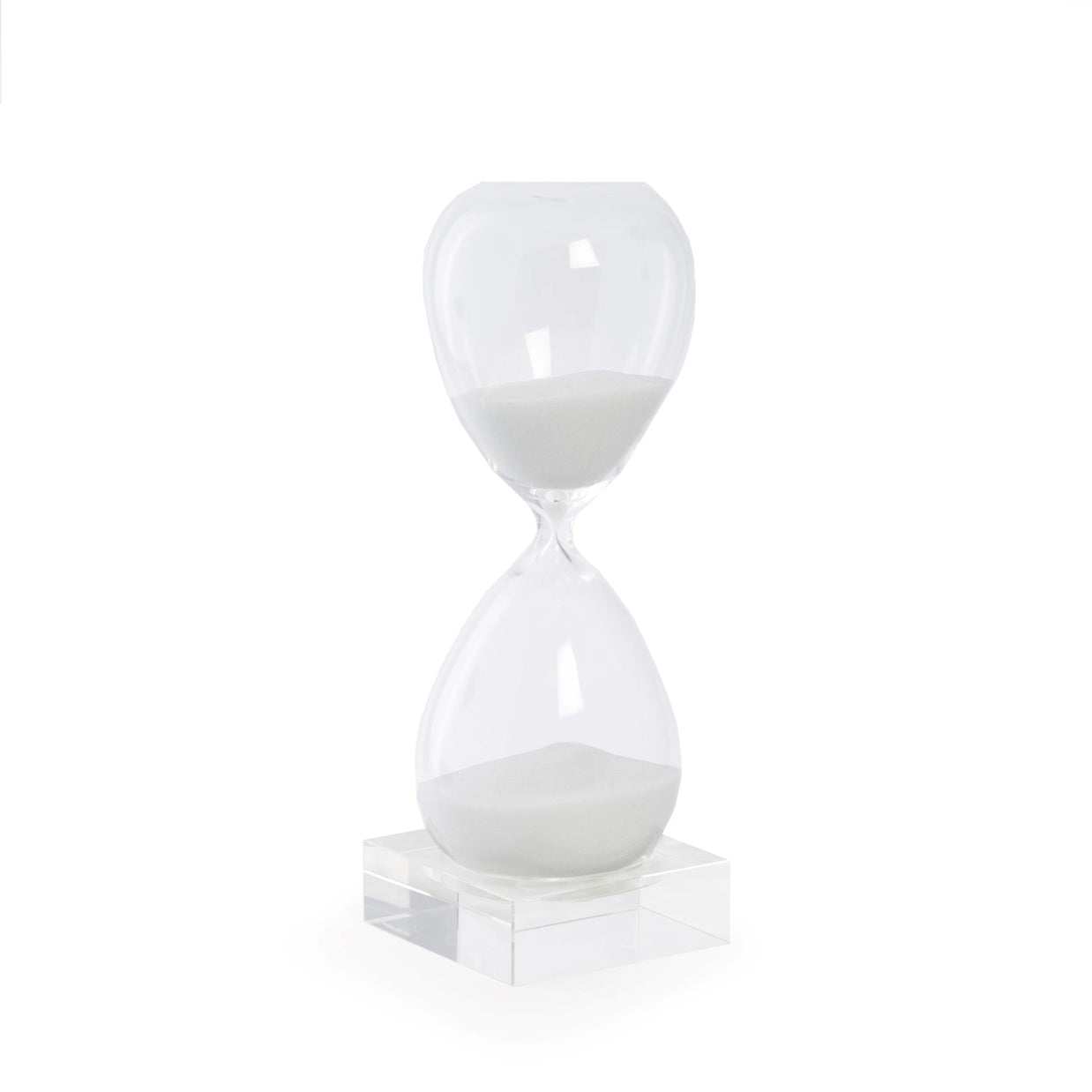 Clear glass hourglass with white sand on transparent acrylic base, sand partially flowing through narrow center opening