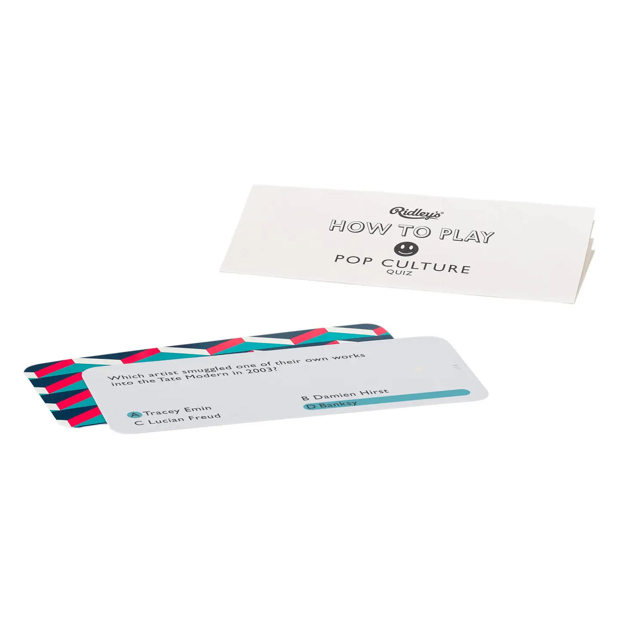 Pop culture trivia card game with white instruction box and stack of rounded quiz cards with pink teal navy striped edges