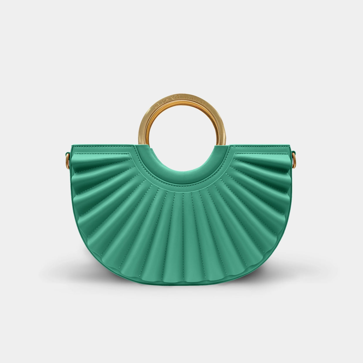 Emerald green leather half-moon handbag with sunburst quilted pattern and polished brass circular top handle