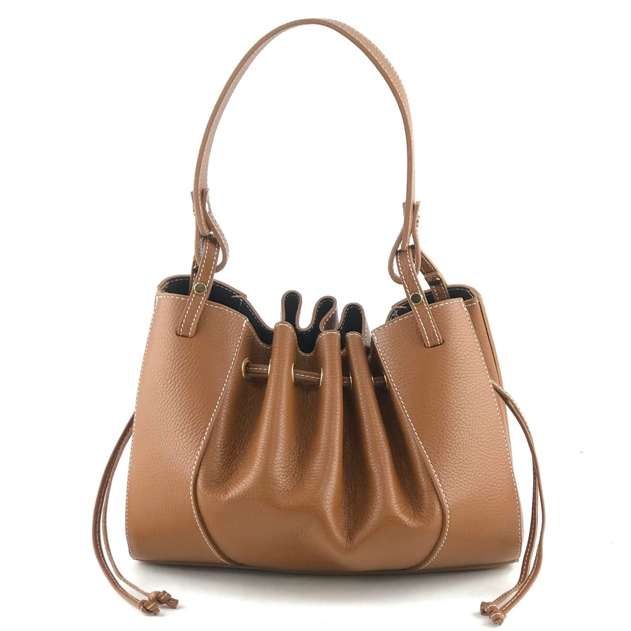Tan pebbled leather shoulder bag with drawstring cinch closure, contrast stitching, and adjustable knotted side straps.