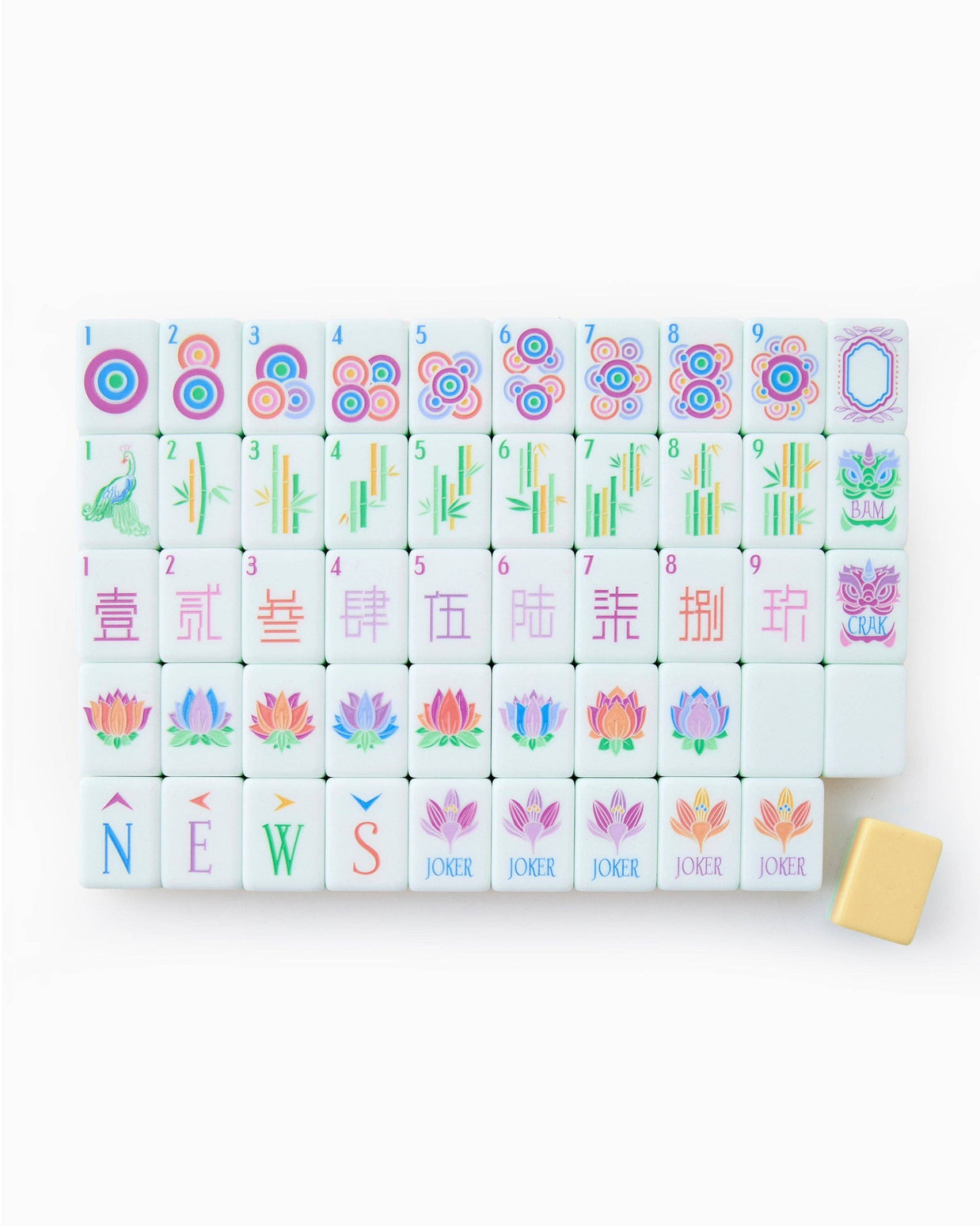 White mahjong tiles with pastel pink, blue, yellow designs featuring circles, bamboo, Chinese characters, lotus flowers, and peacock