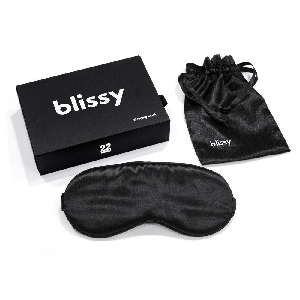 Black silk sleep mask with satin drawstring pouch and matte black gift box with white blissy logo branding