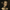 Artistic depiction of a woman with intricate headgear and tattoos on a dark background