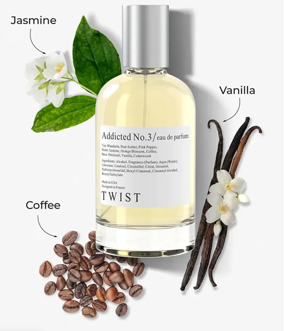 Eau de parfum bottle with silver cap and pale yellow liquid surrounded by jasmine flowers, coffee beans, and vanilla pods