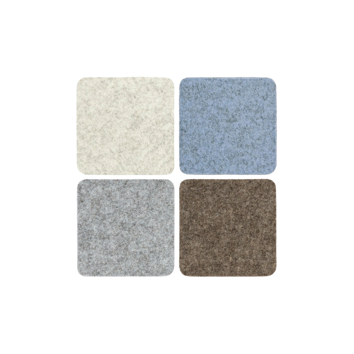 Set of four square felt coasters in cream, light blue, gray, and brown with mottled wool texture and rounded corners