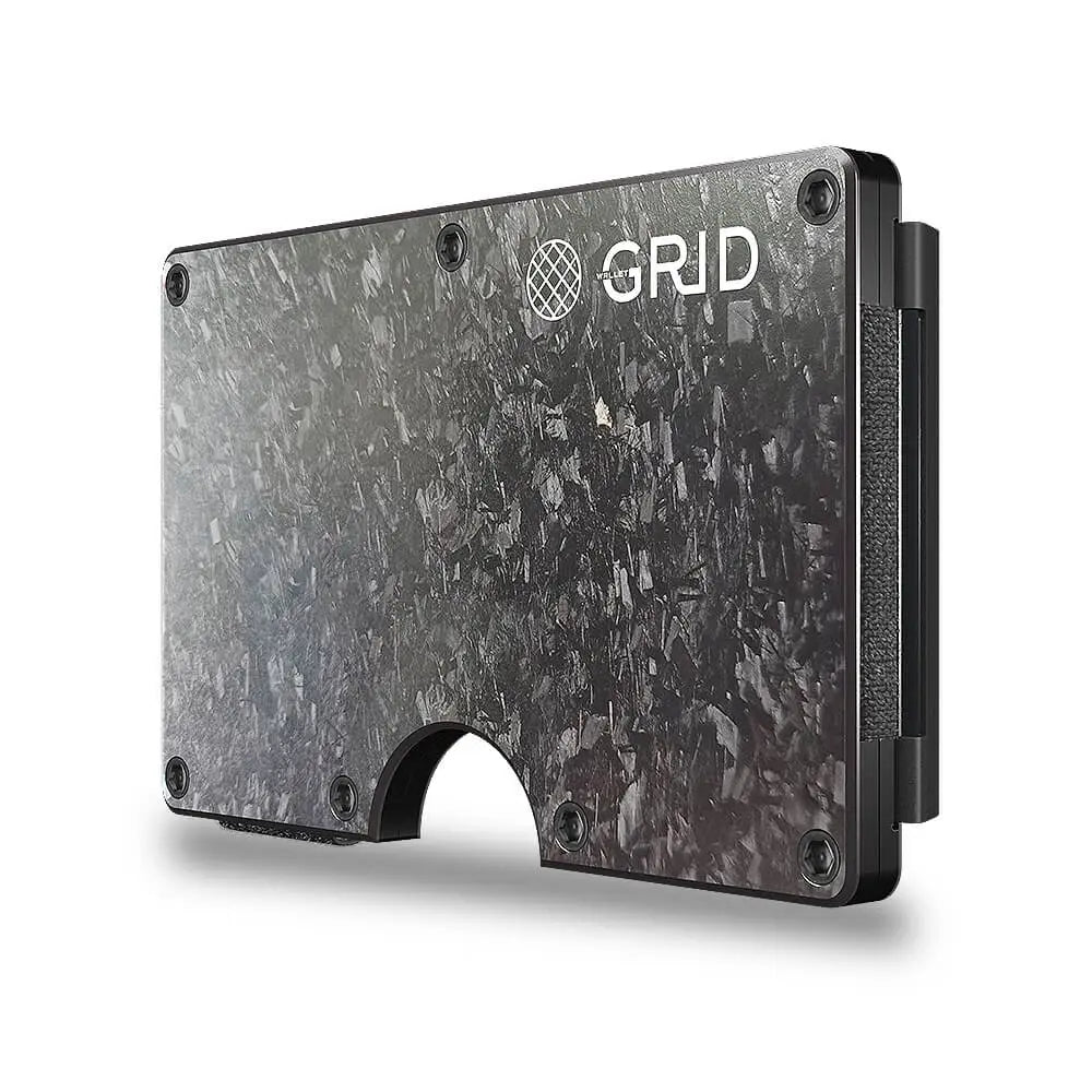 Slim carbon fiber wallet with marbled gray surface, white GRID logo, black corners, and elastic strap closure on side