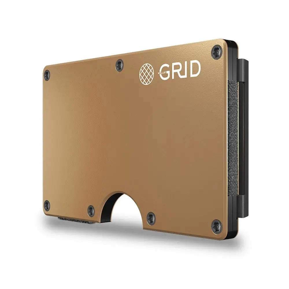 Slim gold anodized aluminum wallet with GRID logo, visible screws, black elastic band, and curved cutout at bottom edge