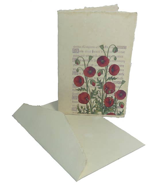 Card with floral design and matching envelope on a white background