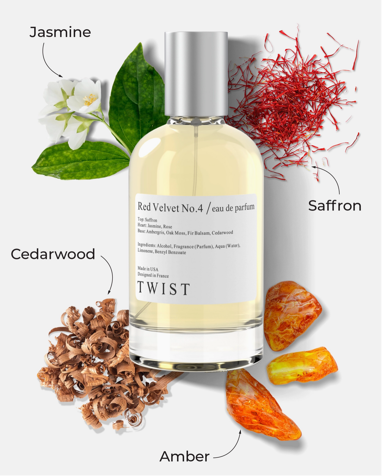 Twist Red Velvet No.4 perfume bottle with silver cap surrounded by jasmine flowers, saffron threads, cedarwood chips and amber stones