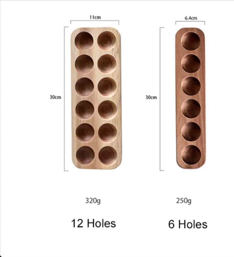 Natural wood egg holders showing 12-hole and 6-hole vertical designs with circular indentations and dimension labels