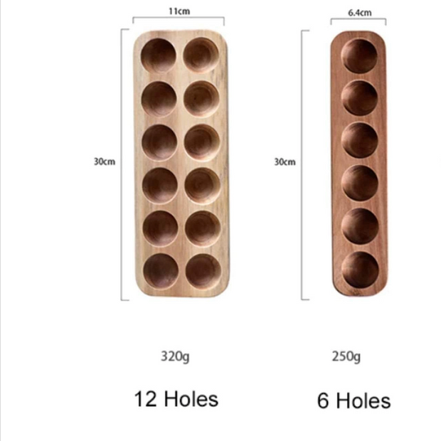 Natural wood egg holders showing 12-hole and 6-hole vertical designs with circular indentations and dimension labels