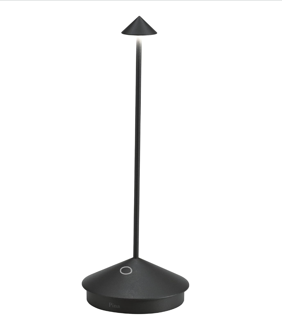 Matte black portable LED lamp with slender vertical pole, conical shade, rounded weighted base, and touch control button