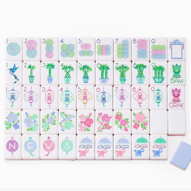 Pastel mahjong tiles featuring watercolor bamboo, lanterns, flowers, and monkeys with pink and blue accents on white tiles