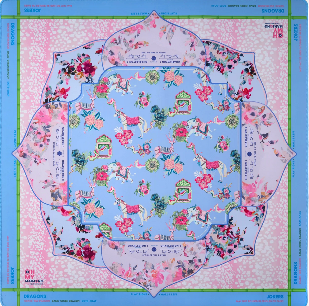 Square mahjong mat with periwinkle blue center featuring colorful elephants, florals, and ornate temples on pink floral border