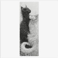 Yoga mat featuring black and white long-haired cats in yin-yang formation with ornate swirling patterns on gray background.