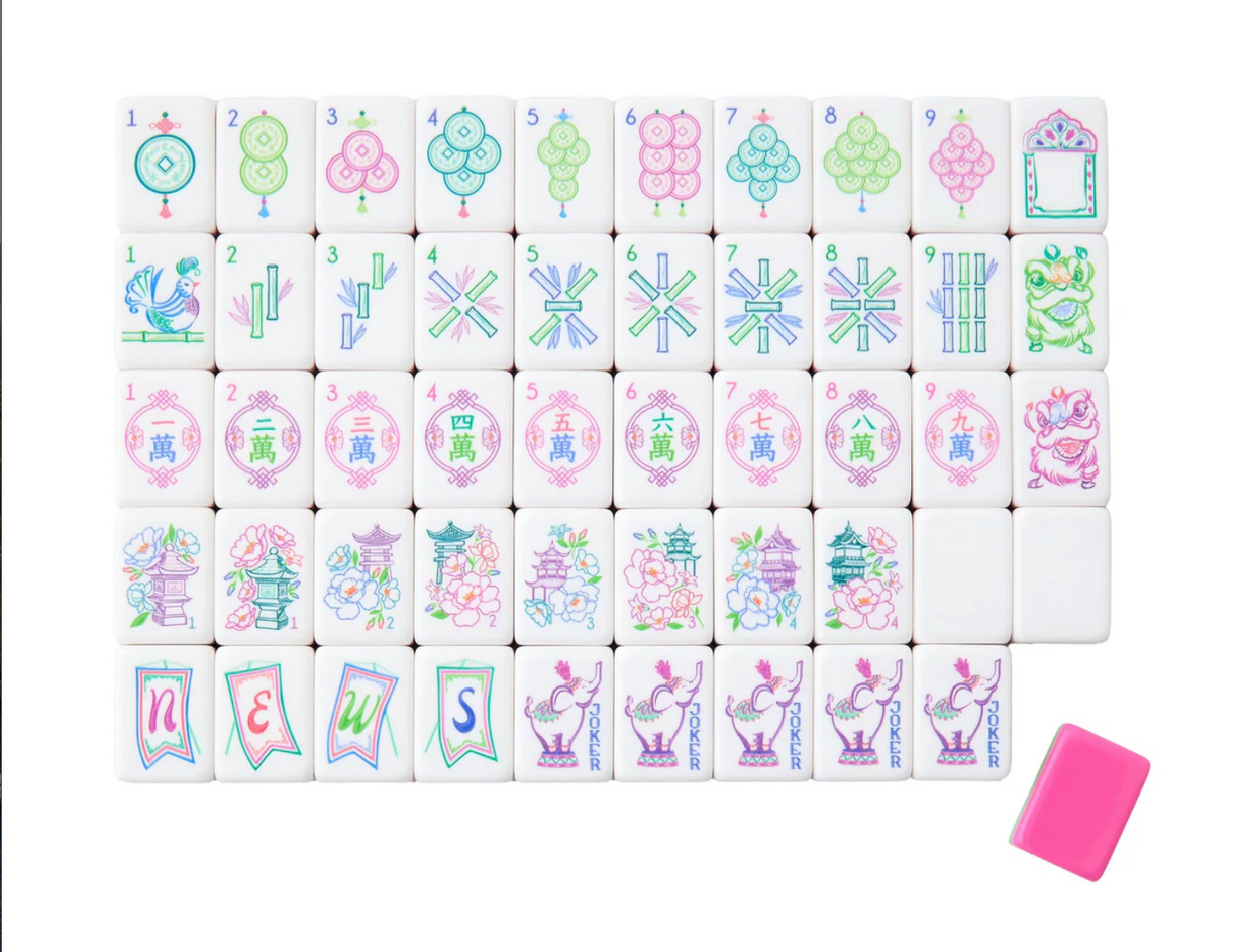 Mahjong tile set with pastel pink, turquoise, and green designs featuring ornate Asian-inspired patterns and characters on white tiles