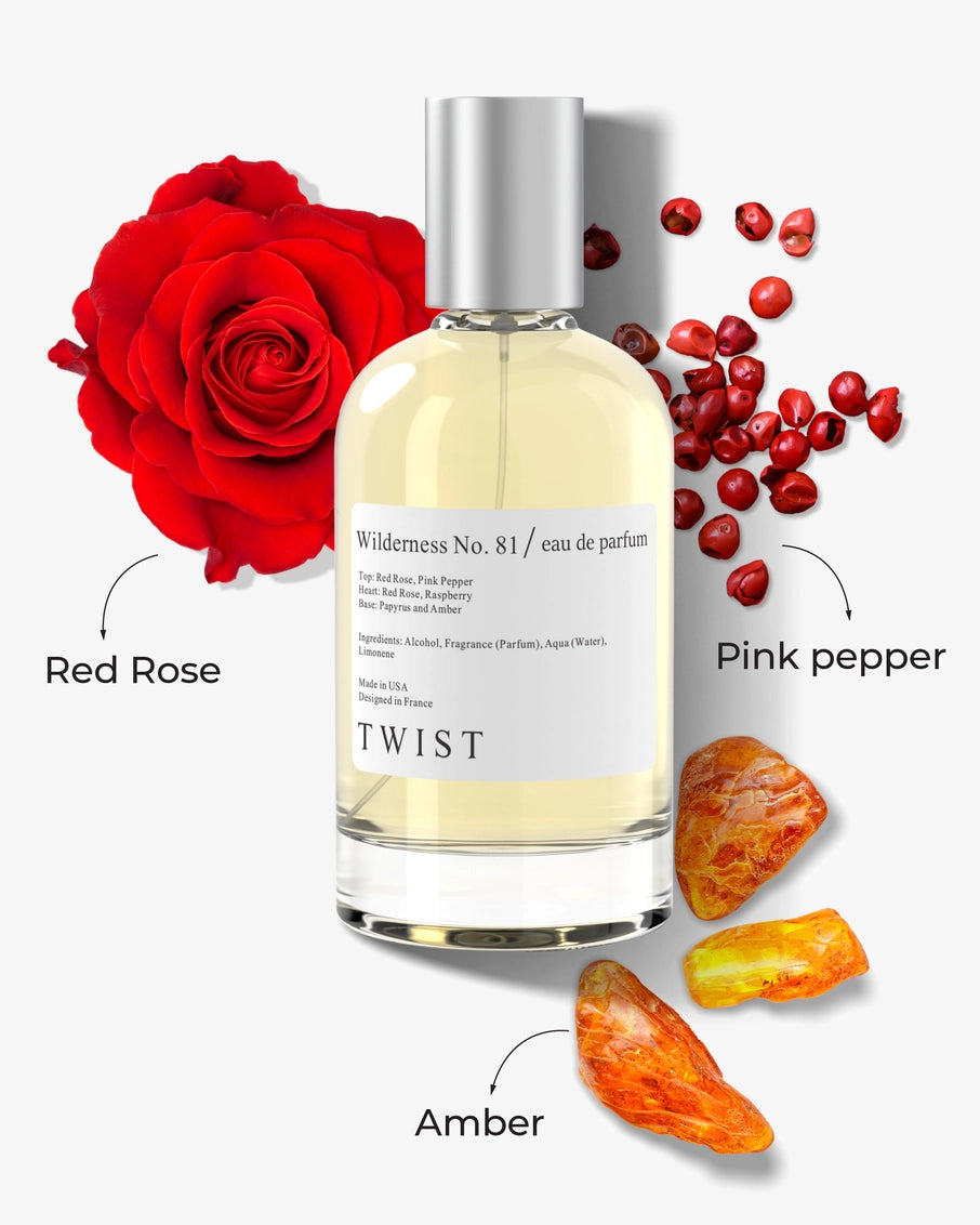 Twist Wilderness No. 81 eau de parfum bottle with silver cap surrounded by red rose, pink peppercorns, and amber stones