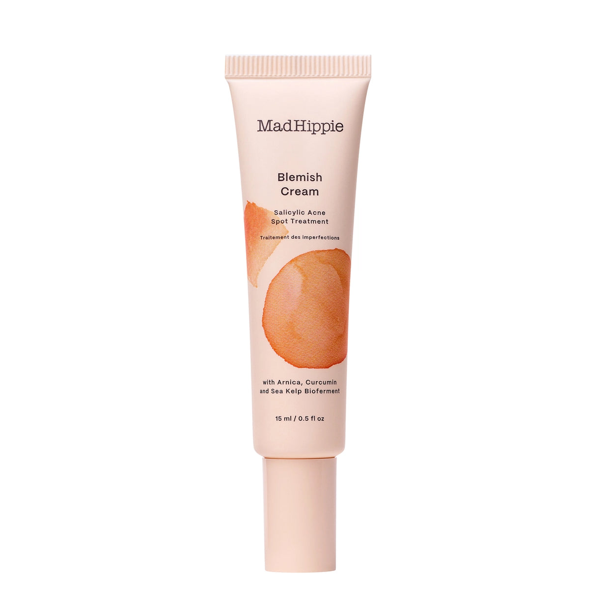 Blush pink tube of MadHippie Blemish Cream with orange circular watercolor design and salicylic acid spot treatment text