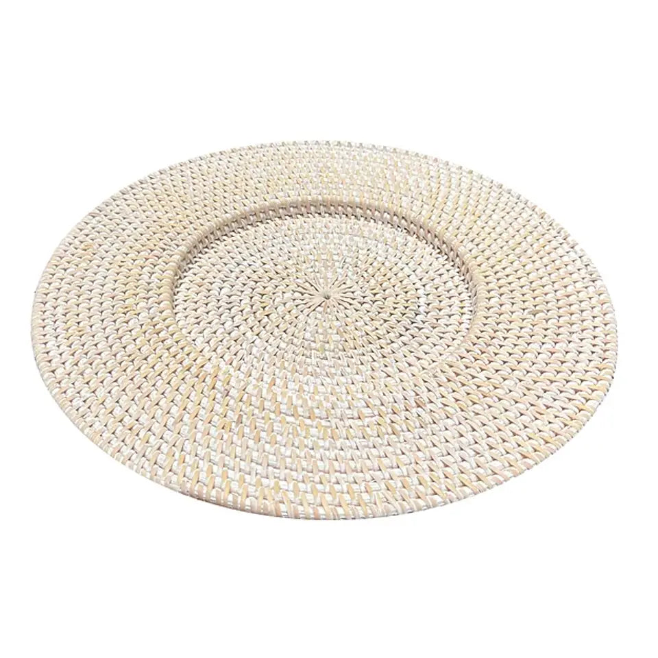 Whitewashed round rattan charger plate with tightly woven natural fiber in concentric circular pattern and raised rim