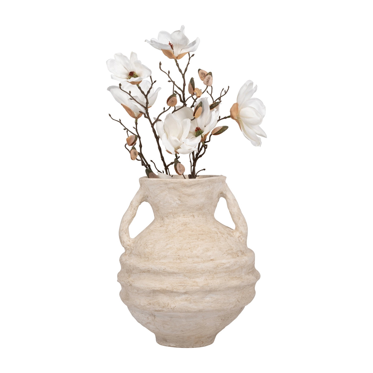 Textured beige ceramic vase with cutout handles holding white magnolia branches with brown buds on white background