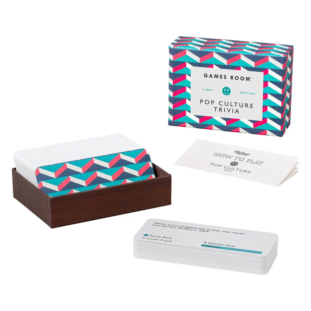 Pop culture trivia card game with geometric chevron pattern box in turquoise, pink, navy, and white with wooden card holder
