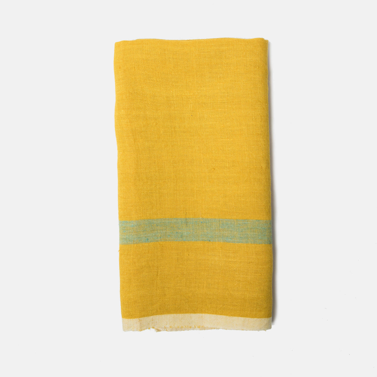 Folded golden yellow linen towel with sage green horizontal stripe and cream fringed edge on white background