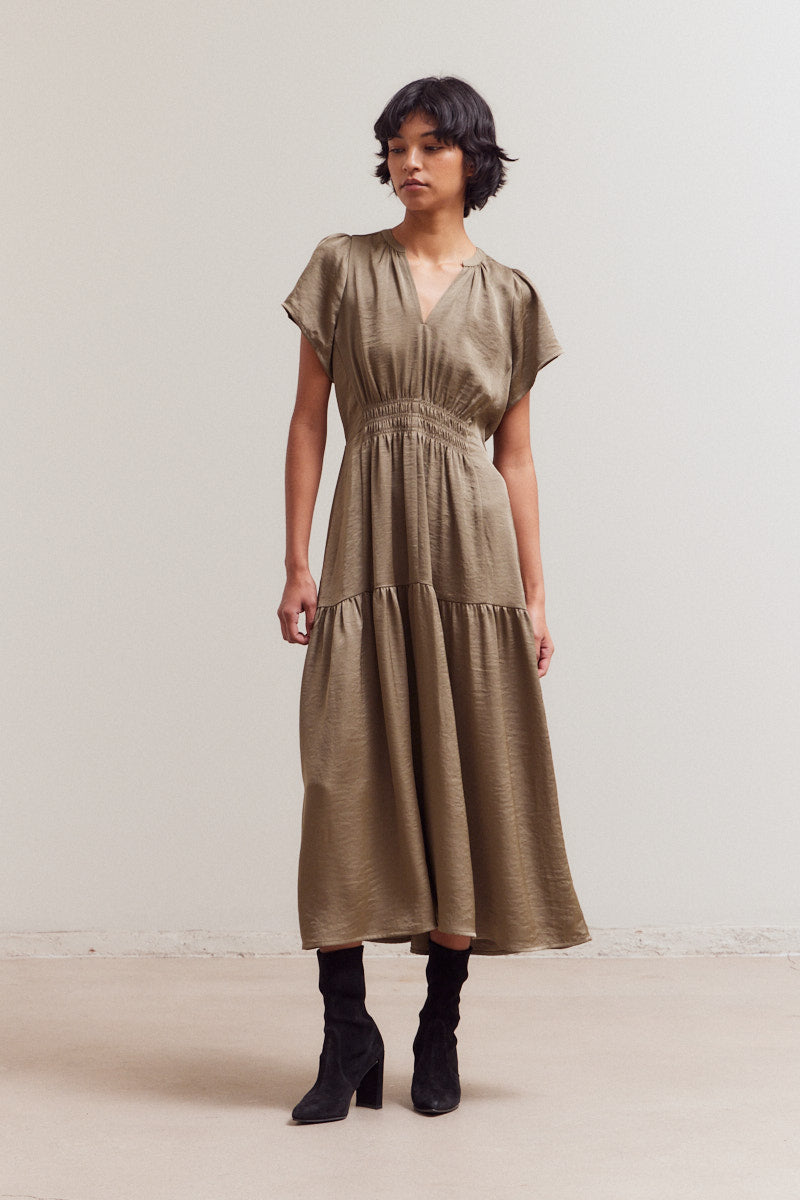 Olive taupe midi dress with V-neck, short sleeves, smocked waist, and tiered ruffle hem in flowing textured fabric