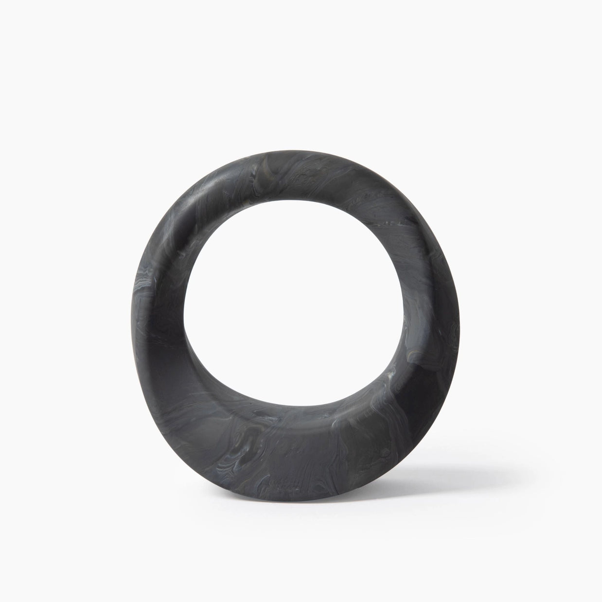 Charcoal gray marbled resin donut-shaped 7-pound weight with smooth organic swirl pattern and hollow center opening