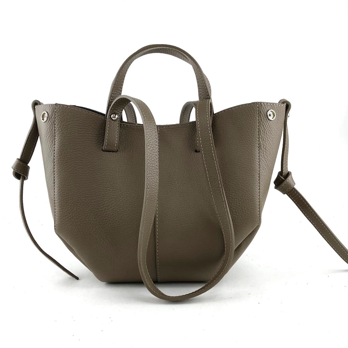 Olive green pebbled leather tote bag with dual top handles, adjustable crossbody strap, and silver grommet details
