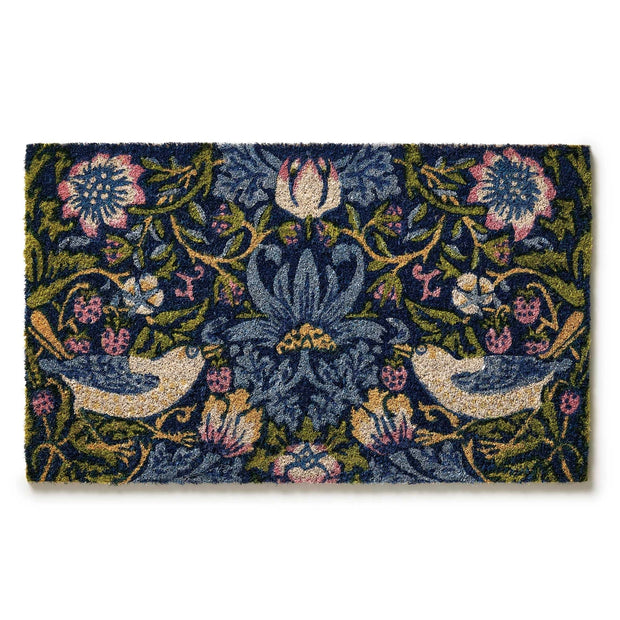 Navy coir doormat with William Morris-inspired floral pattern featuring cream birds, pink flowers, and olive green vines
