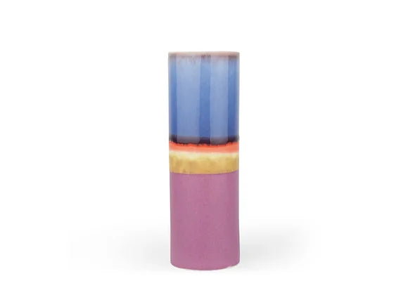 Tall cylindrical ceramic vase with color-blocked glaze in periwinkle blue, coral orange, yellow and dusty pink bands
