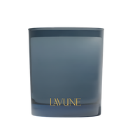 Blue candle with 'LAVUNE' branding on a beige background